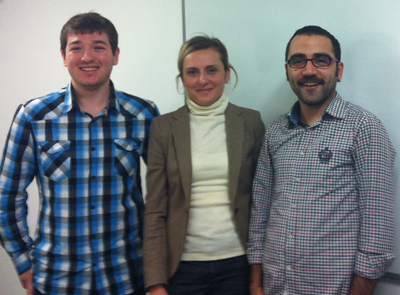 Turkcell's Yesim Tohma (center) with students Burakhan Gedik (left) and Akin Moroglu.