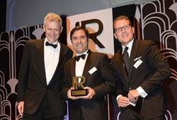 Miguel Viana of EDP (center) picks up an award at the IR Magazine Awards – Europe 2015